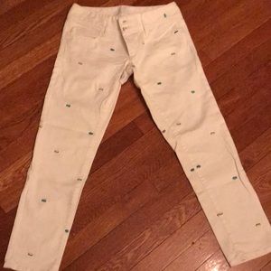 Lilly Pulitzer white embroidered jeans.